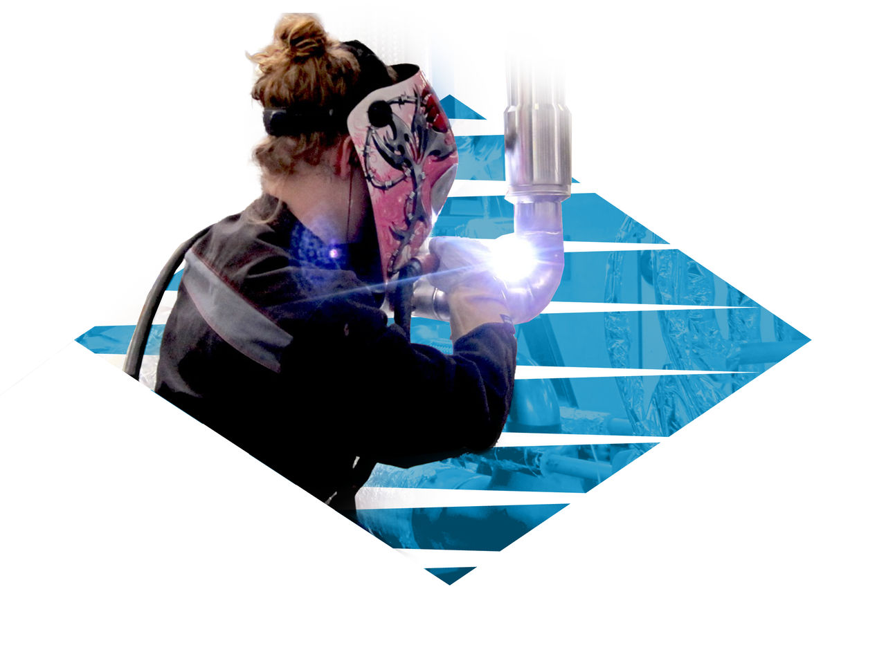 Person welding a hydrogen vacuum-jacketed valve